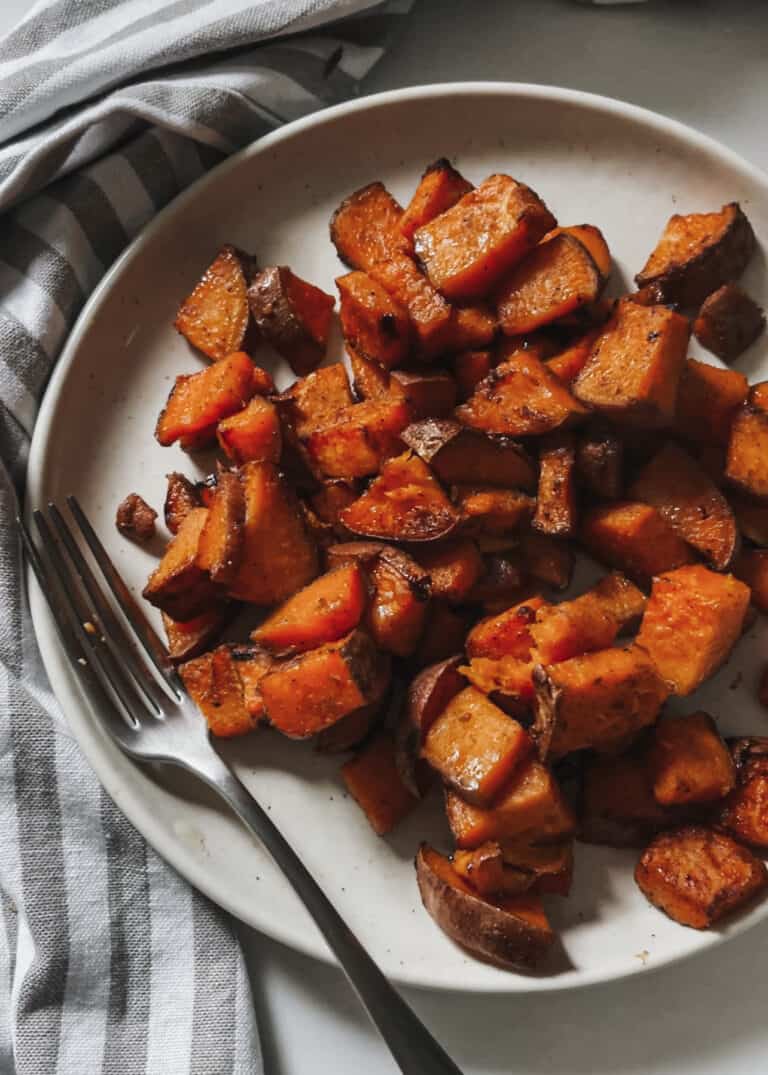 crispy roasted sweet potatoes with a creamy garlic spread