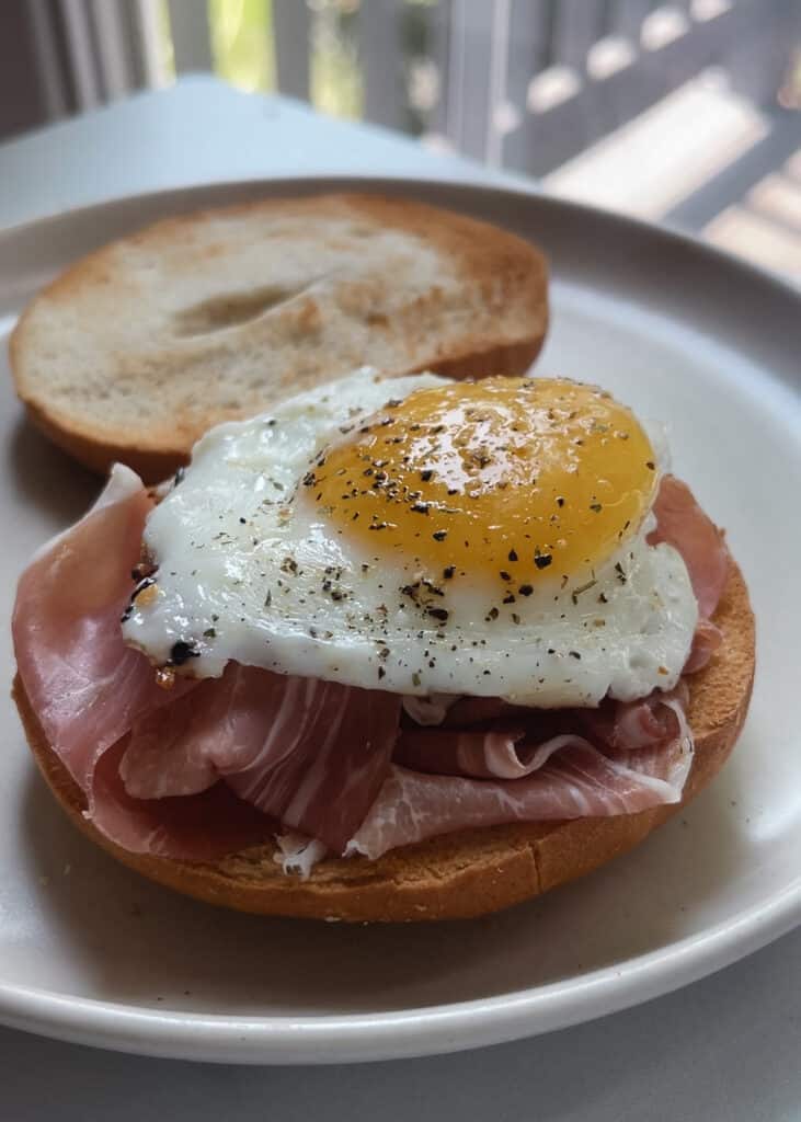 Prosciutto, egg and cheese on a gluten free bagel