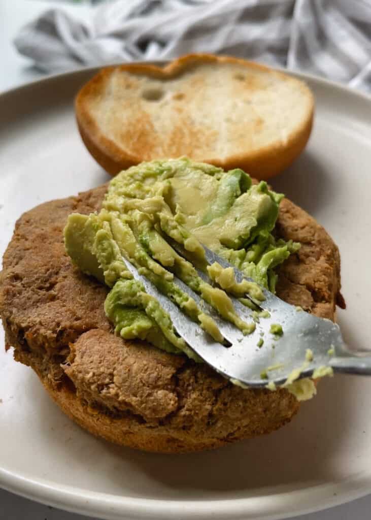 gluten free burger bun with tuna patty and avocado