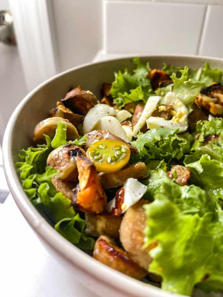 Chicken sausage salad with sweet potatoes and honey mustard