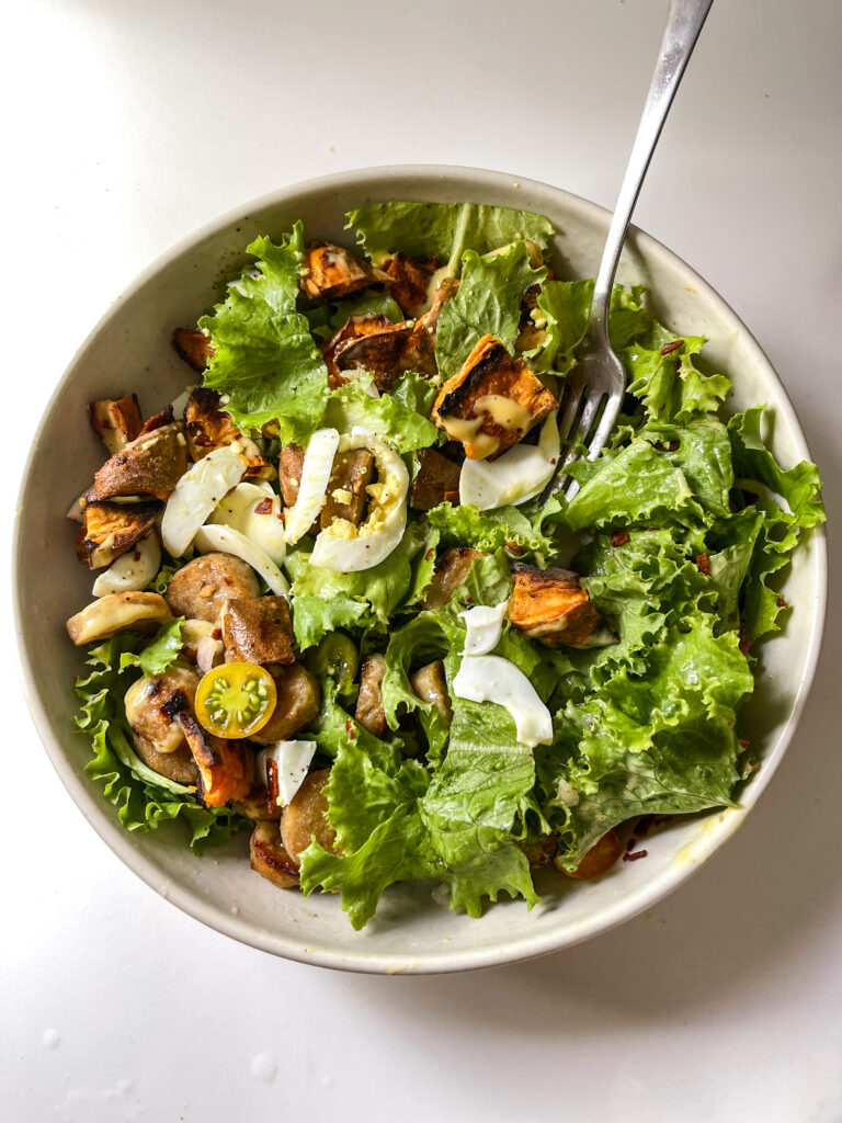 Chicken sausage salad with sweet potatoes and honey mustard