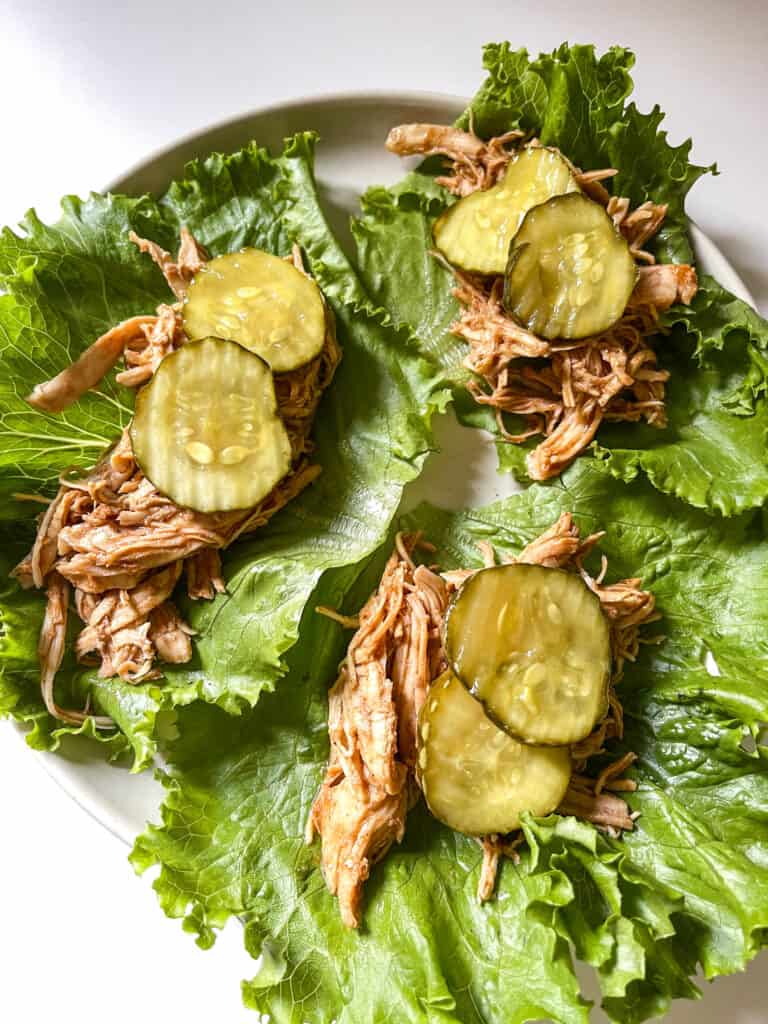 bbq chicken lettuce wraps with pickles on top