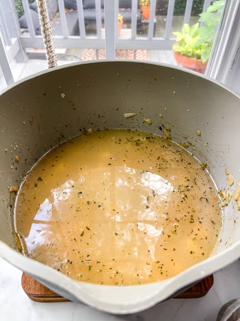 gluten free turkey soup being made in a pot