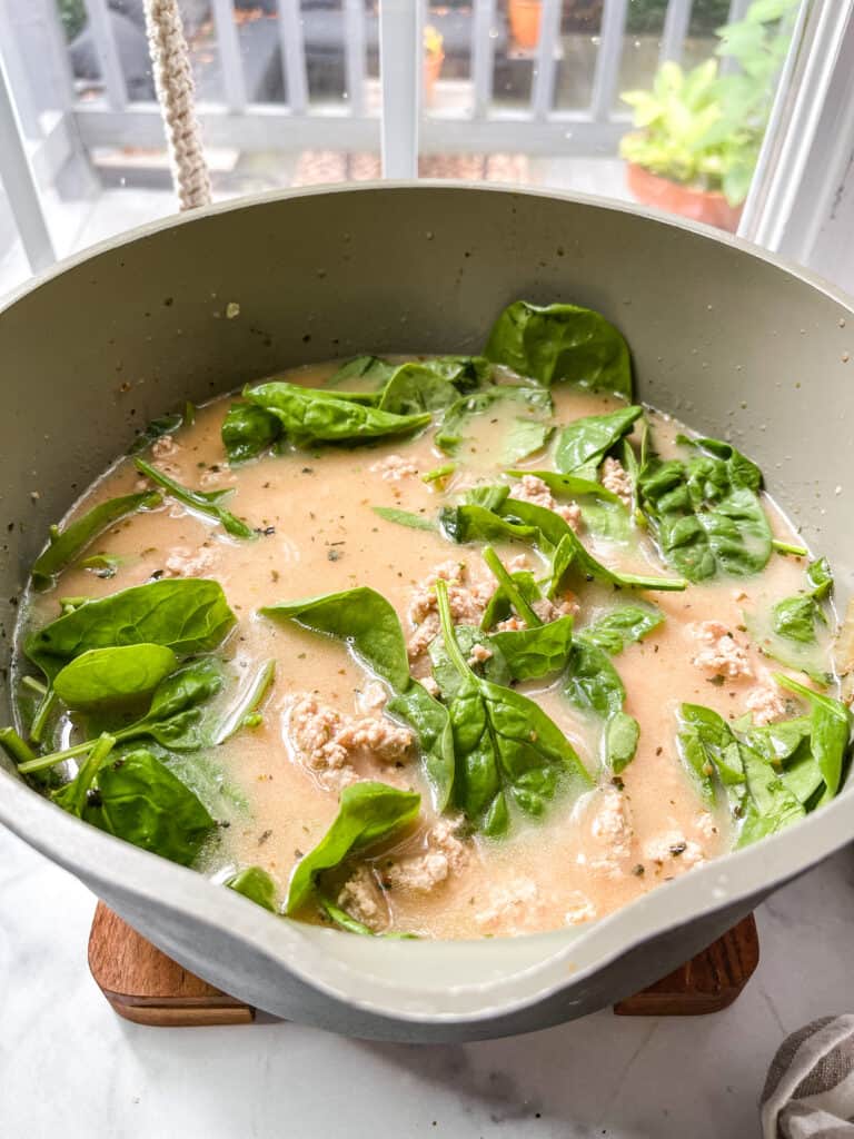 gluten free turkey soup being made in a pot