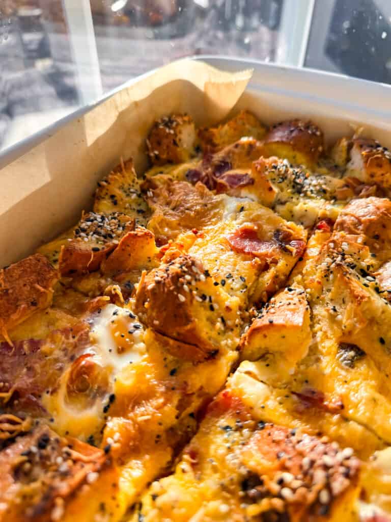 gluten free breakfast casserole with bacon, egg, cheese and gluten free bagels