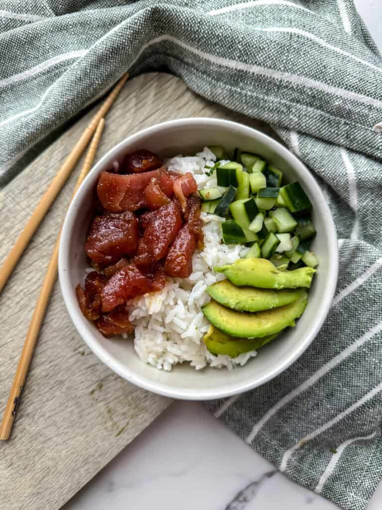 Poke bowl with avocado, tuna, cucumber 