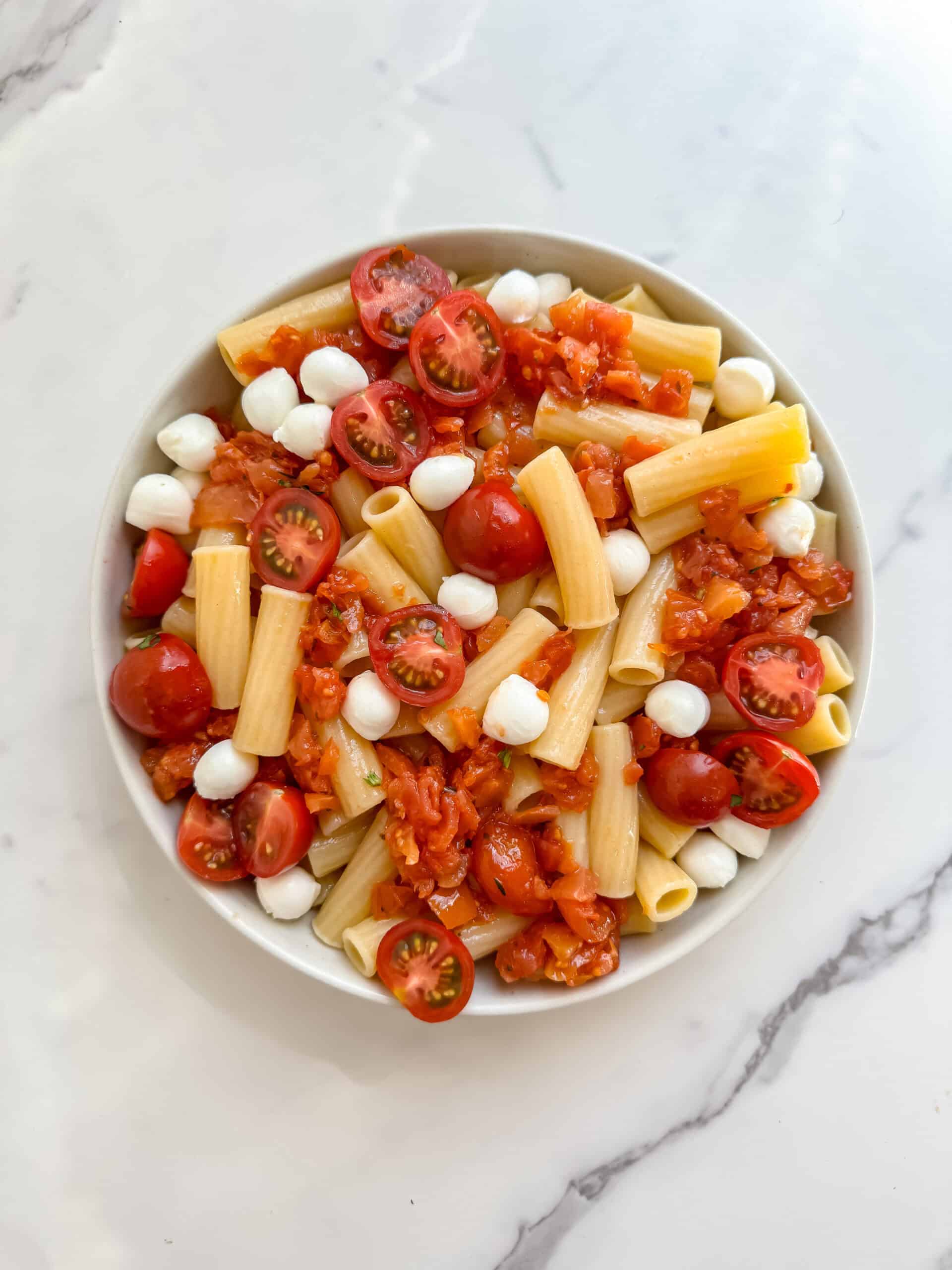 pasta in a bowl with tomatoes